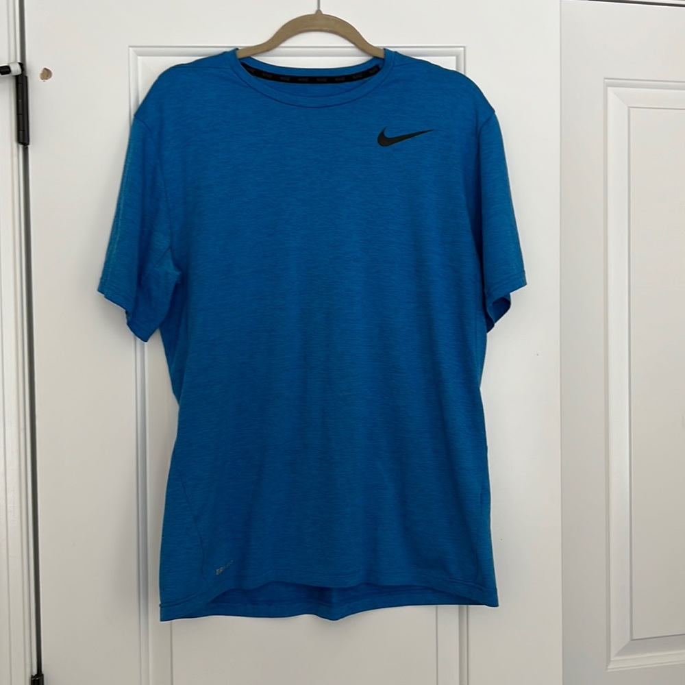 THREE Men’s Nike Shirts